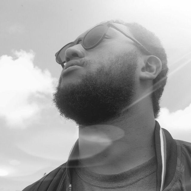 Biruk Habtamu outdoors wearing sunglasses